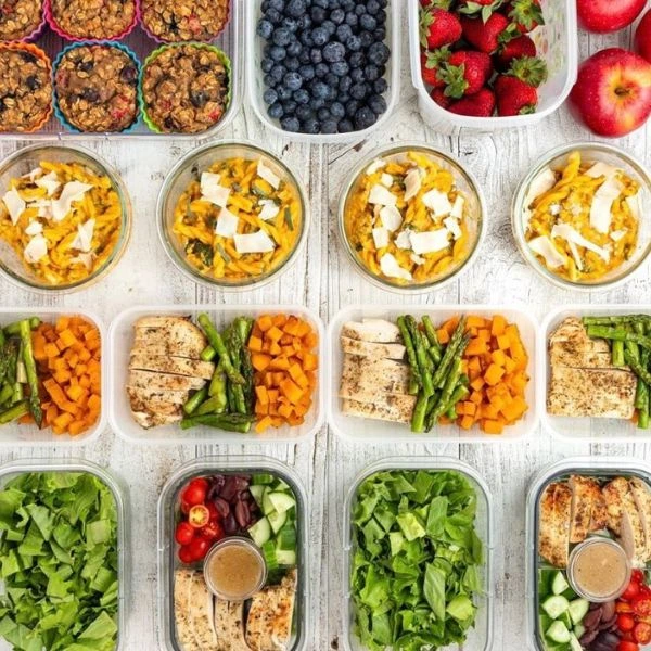 Image of meal prep options with dinners, snacks, and fruit
