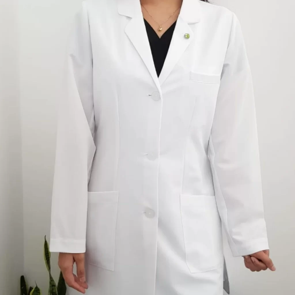 Photo of someone dressed in a white lab coat