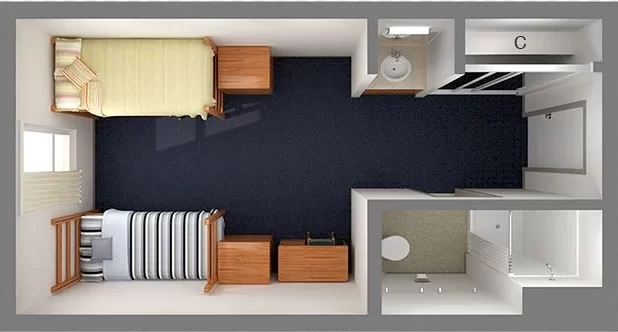 This is the layout of a traditional dorm style room with two beds in a shared room.