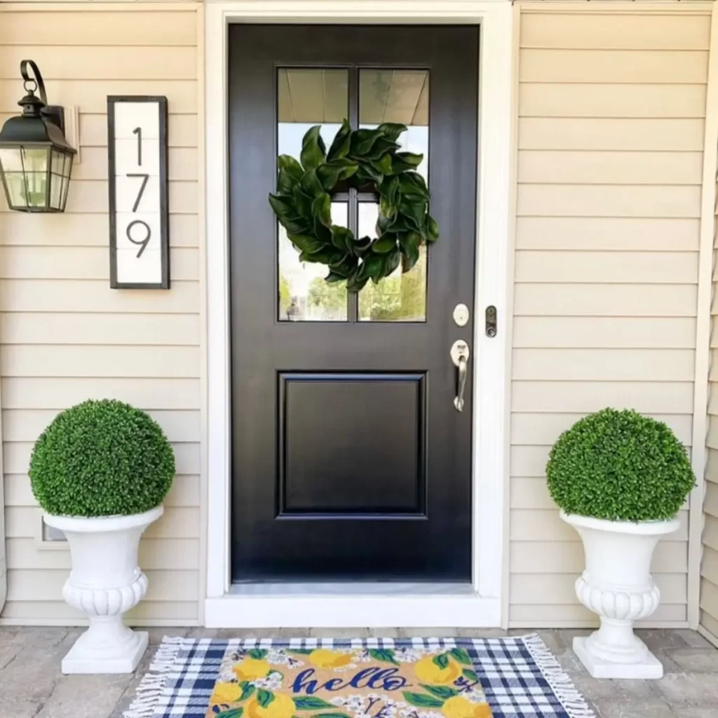 Image of a planted door decor with a door mat