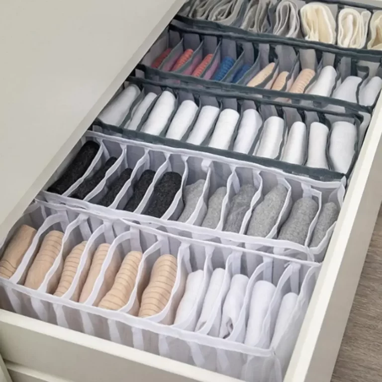 this photo is of a fabric dresser drawer organizer