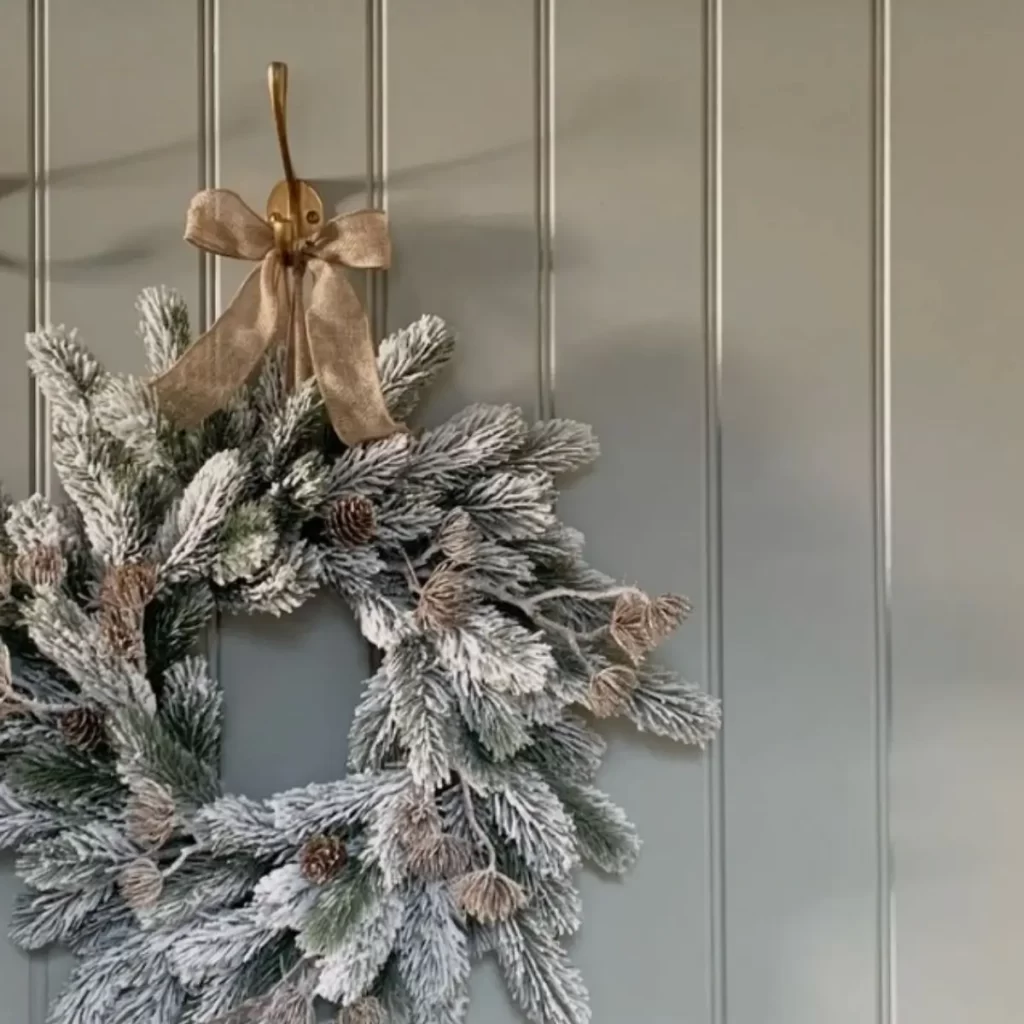 Image of a frosted wreath door decor