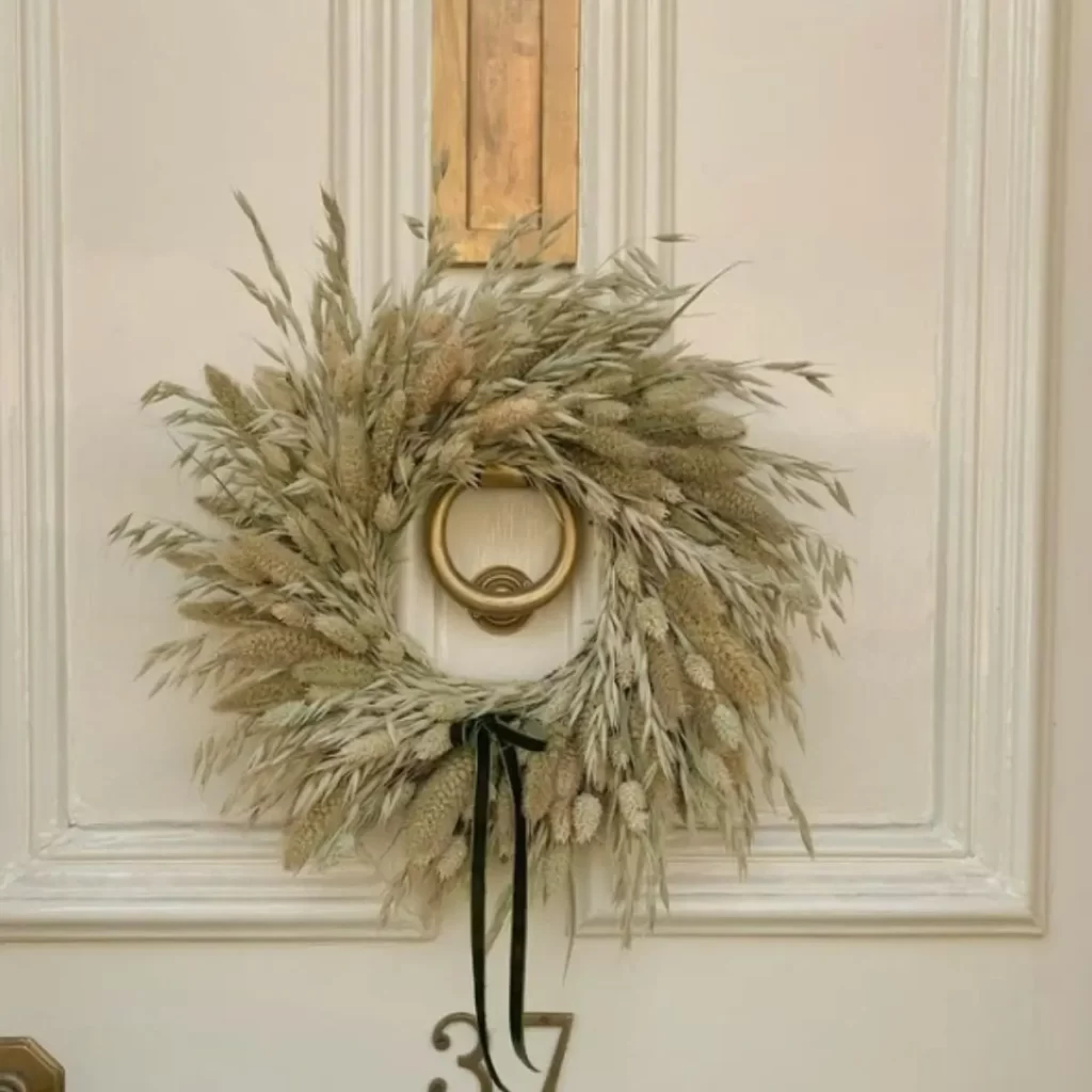 Image of a golden door wreath for a apartment door